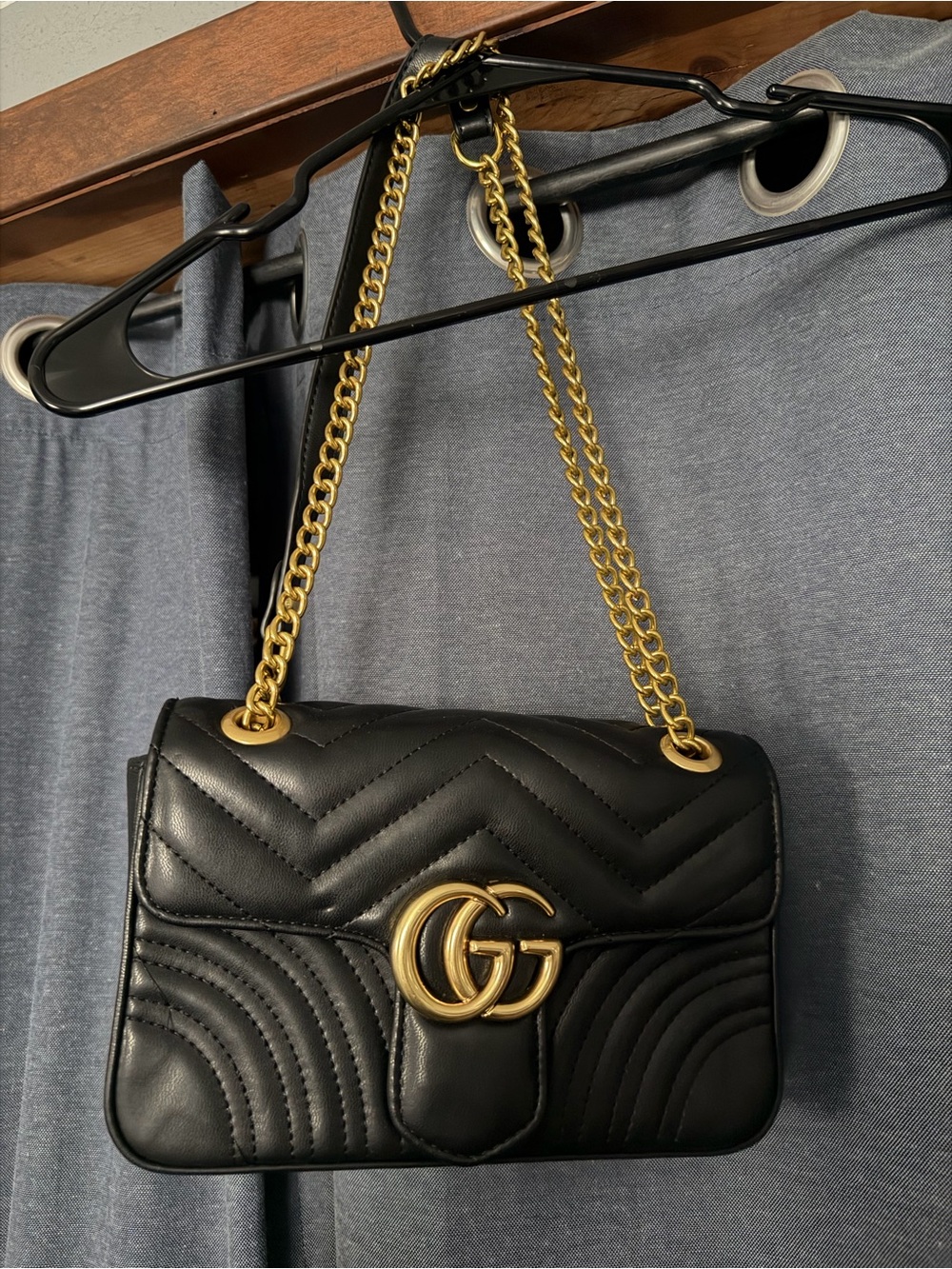 Black Leather Quilted Shoulder Bag with Gold Hardware